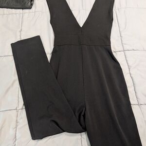 Aqua Black Jumpsuit with Deep V-Neckline and Fitted Waist